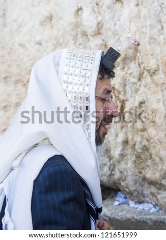 JERUSALEM - SEP 25 : Jewish man prays during the penitential prayers the Selichot , held on September 25 2012 in the Wailing wall in Jerusalem Israel