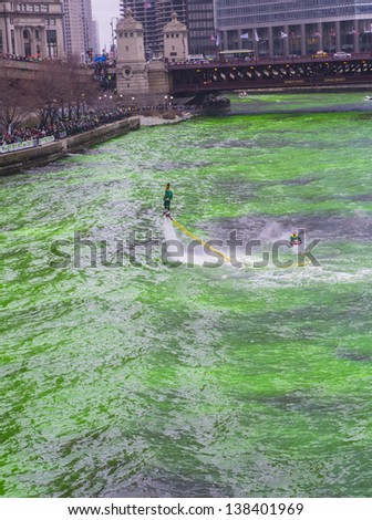 CHICAGO - MARCH 16: The Chicago River is dyed green for St. Patrick\'s Day in Chicago on March 16, 2013