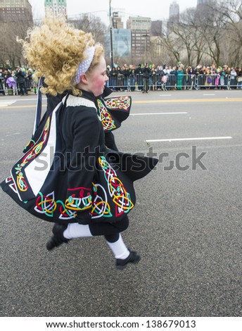 CHICAGO - MARCH 16 : Irish dancers participate at the annual Saint Patrick\'s Day Parade in Chicago on March 16 2013