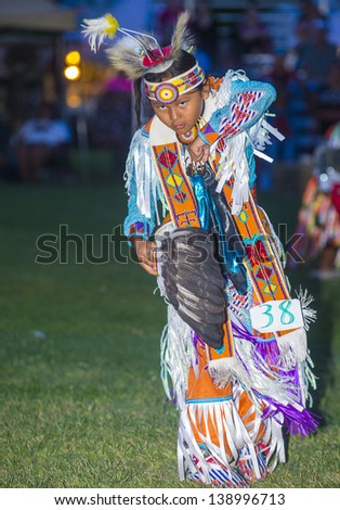 MARIPOSA ,USA - MAY 11 : Unidentified Native Indian boy takes part at the Mariposa 20th annual Pow Wow in California , USA on May 11 2013 ,Pow wow is native American cultural gathernig event.