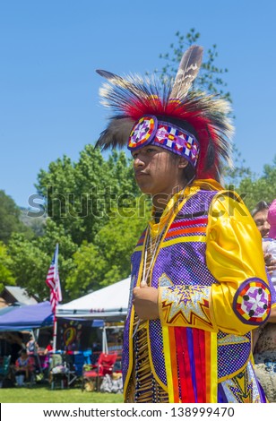 MARIPOSA ,USA - MAY 11 : An unidentified Native Indian man takes part at the Mariposa 20th annual Pow Wow in California , USA on May 11 2013 ,Pow wow is native American cultural gathernig event.