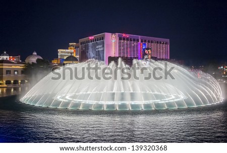 LAS VEGAS - FEB 11: Night view of the dancing fountains of Bellagio and flamingo hotel in Las Vegas Nevada, USA on February 11 , 2013