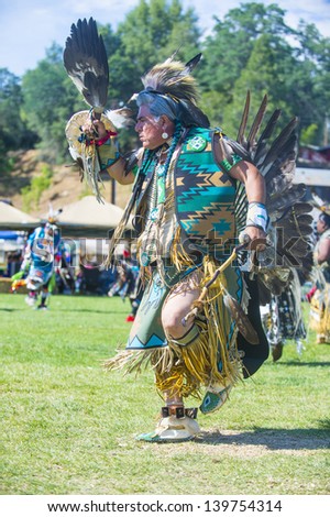 MARIPOSA ,USA - MAY 11 : An unidentified Native Indian man takes part at the Mariposa 20th annual Pow Wow in California , USA on May 11 2013 ,Pow wow is native American cultural gathernig event.