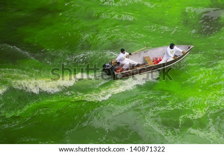 CHICAGO - MARCH 16: The Chicago River is dyed green for St. Patrick's Day in Chicago on March 16, 2013