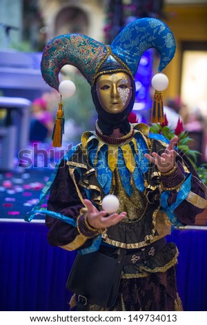 LAS VEGAS - JULY 16 : Performer with Venetian style mask at the Carnevale experience festival in the Venetian Hotel in Las Vegas on July 16, 2013.