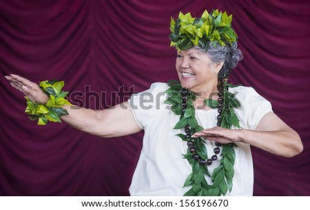 HENDERSON , NEVADA - SEP 15 : Dancer with traditional dress performs Hawaiian dance in the 23rd Annual Hoolaulea Pacific Islands Festival in Henderson Nevada on September 15 , 2013