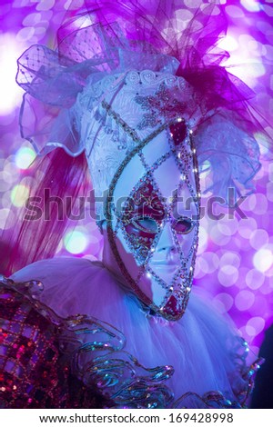LAS VEGAS - DEC 30 : Performer with Venetian style mask at the Carnival experience festival in the Venetian Hotel in Las Vegas on December 30 , 2013.