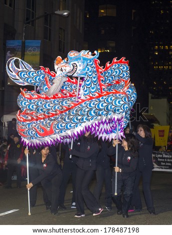 SAN FRANCISCO - FEB 15 : An unidentified participants in a Dragon dance at the Chinese New Year Parade in San Francisco , CA on February 15 2014 , It is the largest Asian event in North America