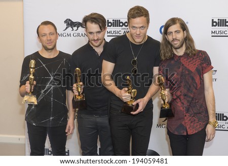 LAS VEGAS - MAY 18 : Members of the alternative rock band Imagine Dragons attend the 2014 Billboard Music Awards press room at the MGM Grand Garden Arena on May 18 , 2014 in Las Vegas.