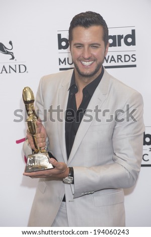 LAS VEGAS - MAY 18 : Recording artist Luke Bryan attends the 2014 Billboard Music Awards press room at the MGM Grand Garden Arena on May 18 , 2014 in Las Vegas.