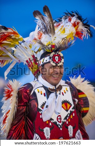 LAS VEGAS - MAY 24 : Native American man takes part at the 25th Annual Paiute Tribe Pow Wow on May 24 , 2014 in Las Vegas Nevada. Pow wow is native American cultural gathernig event.