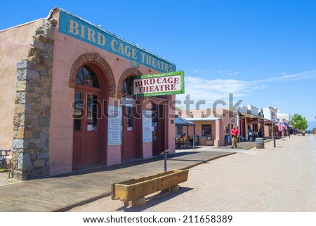 TOMBSTONE , ARIZONA - AUG 09 : A Restored buildings line the main street of Tombstone , Arizona on August 09 2014. Tombstone is a historic western city founded in 1879