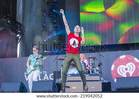 LAS VEGAS - SEP 20: Singer Tyler Glenn of Neon Trees performs on stage at the 2014 iHeartRadio Music Festival Village on September 20, 2014 in Las Vegas.