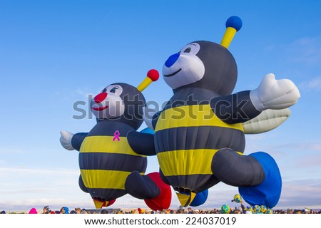ALBUQUERQUE, NEW MEXICO - OCT 11: Balloons fly over Albuquerque on October 11, 2014 in Albuquerque, New Mexico. Albuquerque balloon fiesta is the biggest balloon event in the world.
