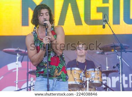 LAS VEGAS - SEP 20: Singer Nasri Atweh and fellow band members of Magic! performs on stage at the 2014 iHeartRadio Music Festival Village on September 20, 2014 in Las Vegas.