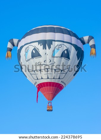 ALBUQUERQUE, NEW MEXICO - OCT 11: Balloon fly over Albuquerque on October 11, 2014 in Albuquerque, New Mexico. Albuquerque balloon fiesta is the biggest balloon event in the world.