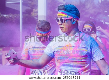 LAS VEGAS - FEB 28 : An unidentified runners at the Las Vegas Color Run on February 28 2015. The Color Run is a 5k worldwide hosted fun race