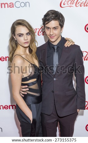LAS VEGAS - APR 23 : Actors Cara Delevingne (L) and Nat Wolff, winners of CinemaCon\'s Rising Stars of the year award, attends the 2015 Big Screen Achievement Awards on April 23 2015 in Las Vegas