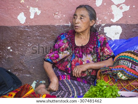 CHICHICASTENANGO , GUATEMALA - JULY 26 : Portrait of an old Guatemalan woman at the Chichicastenango Market on July 26 2015. This native market is the most colorful in Central America