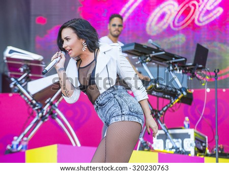LAS VEGAS - SEP 19 : Recording artist Demi Lovato performs onstage at the 2015 iHeartRadio Music Festival at the Las Vegas Village on September 19, 2015 in Las Vegas, Nevada.