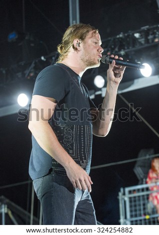 LAS VEGAS - SEP 26 : Dan Reynolds of Imagine Dragons performs on stage at the 2015 Life is Beautiful festival on September 26, 2015 in Las Vegas, Nevada.