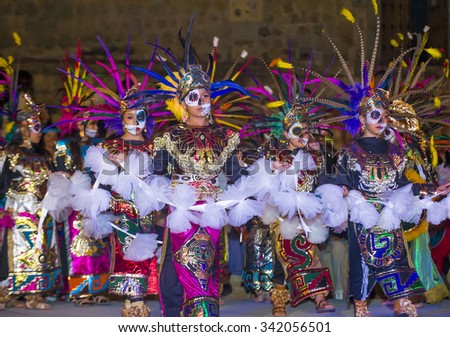 OAXACA , MEXICO - NOV 02 : Unidentified participants on a carnival of the Day of the Dead in Oaxaca, Mexico on November 02 2015. The Day of the Dead is one of the most popular holidays in Mexico