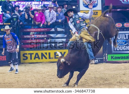 LAS VEGAS - OCT 24 : Cowboy Participating in the PBR bull riding world finals. The bull riding world championship held in Las Vegas Nevada on October 24 2015