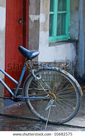 Old bicycle in chinese street in Shanghai