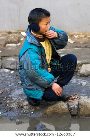 Chinese child in Shanghai street
