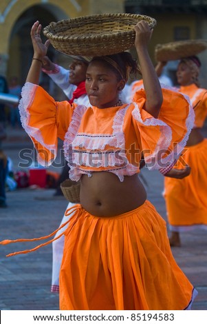 CARTAGENA, COLOMBIA - DEC 22: Unidentified Colombian dancers participate in the launch of the new city logo in the Unesco world heritage city of Cartagena, Colombia on December 22, 2010
