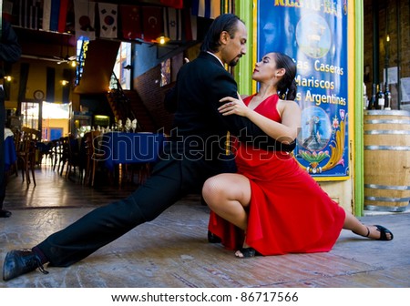 Buenos Aires - Apr 10 : Unidentified Couple Dancing Tango In The Street In Buenos Aires Argentina On April 10 2009 - Tango Has Been On The &Quot;Unesco Intangible Cultural Heritage&Quot; List Since 2009