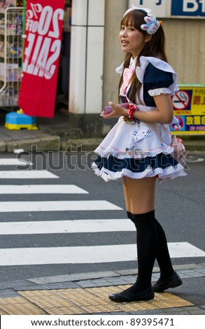 KYOTO,JAPAN - OCT 29 : Japanese girl dressed as a maid promoting 
