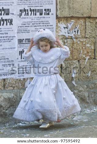 JERUSALEM - MAR. 09 :Ultra Orthodox costumed girl during Purim in Mea Shearim Jerusalem on Mar. 09 2012 ,Purim is a Jewish holiday celebrates the salvation of the jews from jenocide in ancient Persia