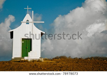 Small White Church with Cross on a Hill