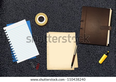 Book office papers and pen
