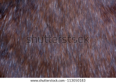 Brown, black and white animal fur background