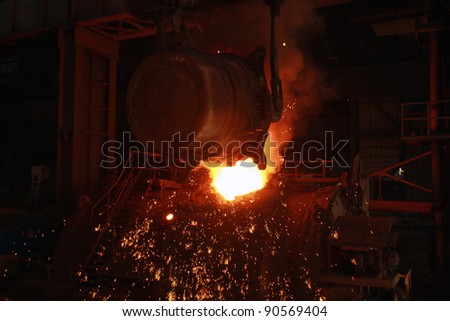 red-hot molten steel in a iron and steel enterprise production scene