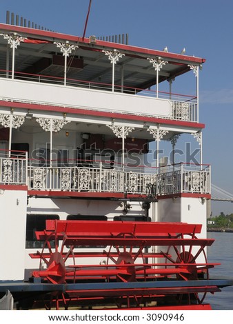 back end of Riverboat with red paddle wheel