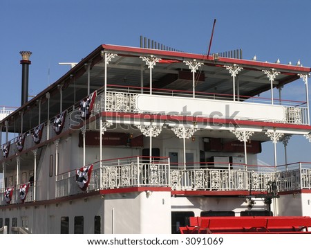 back end of Riverboat with red paddle wheel