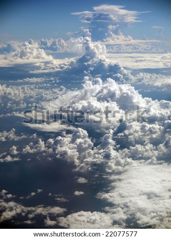 Spiked Fluffy White Cloud Pattern over Ocean