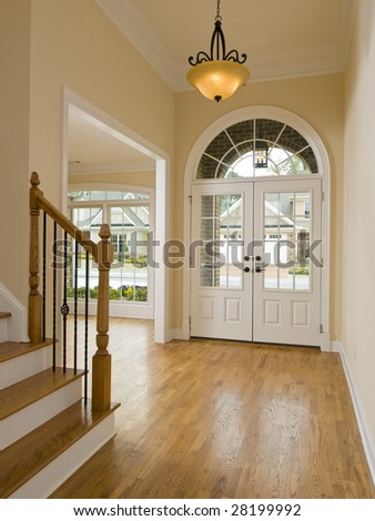 Luxury Home Foyer Door and Staircase with light