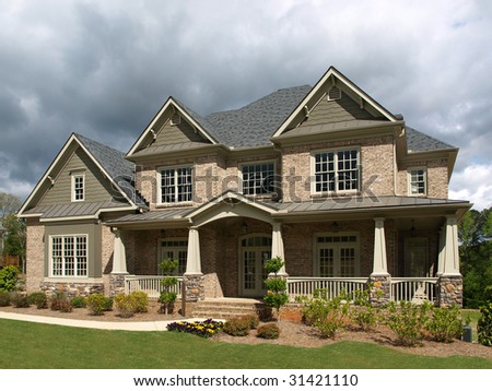 Luxury Model Home Exterior with stormy weather