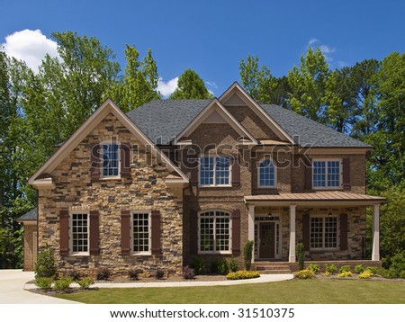 Model Luxury Home Exterior front view with porch