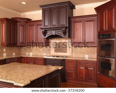 Luxury Home Kitchen with center island and cabinets