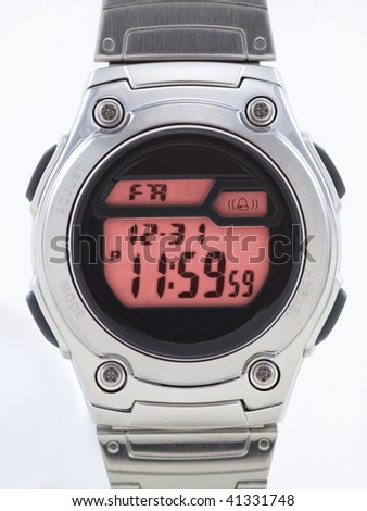 digital watch face. stock photo : Digital Watch close up with red face on white
