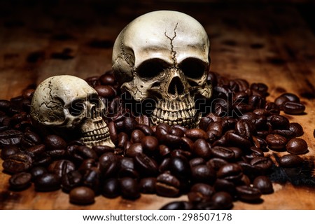 close up Human Skull with coffee beans