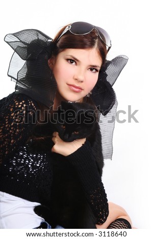 young pretty woman in black with pussy cat on the white background