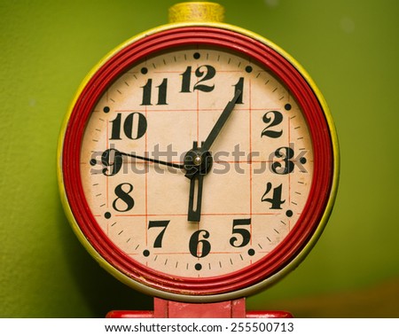 old rusty alarm clock face close up