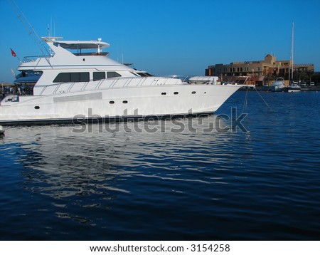 luxurious yacht moored at sunny bay