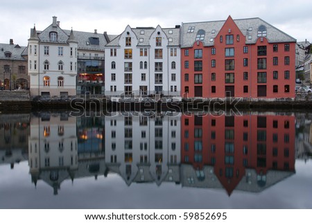 view with sea-front at the city of Alesund , Norway. White night time  shoot